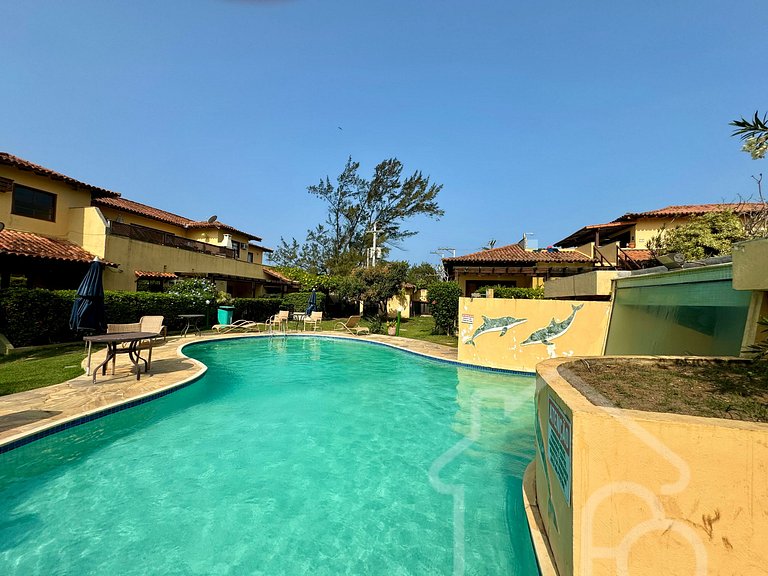 Casa em condomínio pé na areia