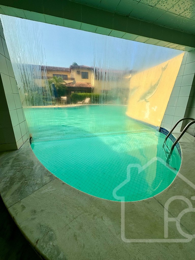Casa em condomínio pé na areia