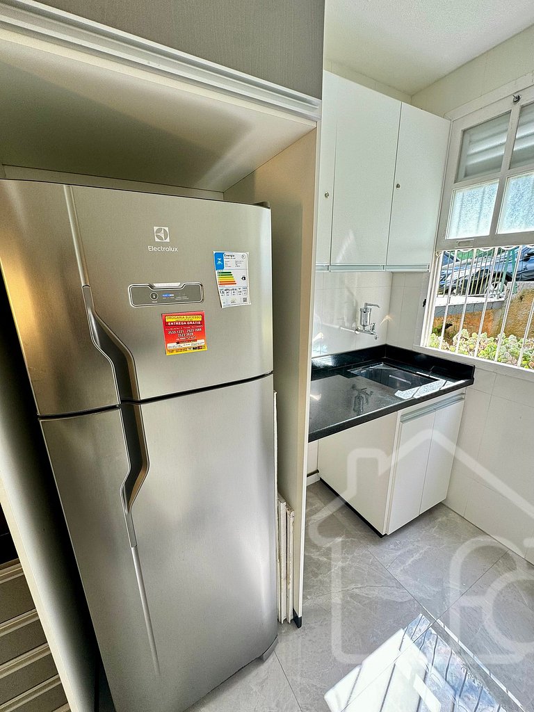 Apartamento em condomínio familiar