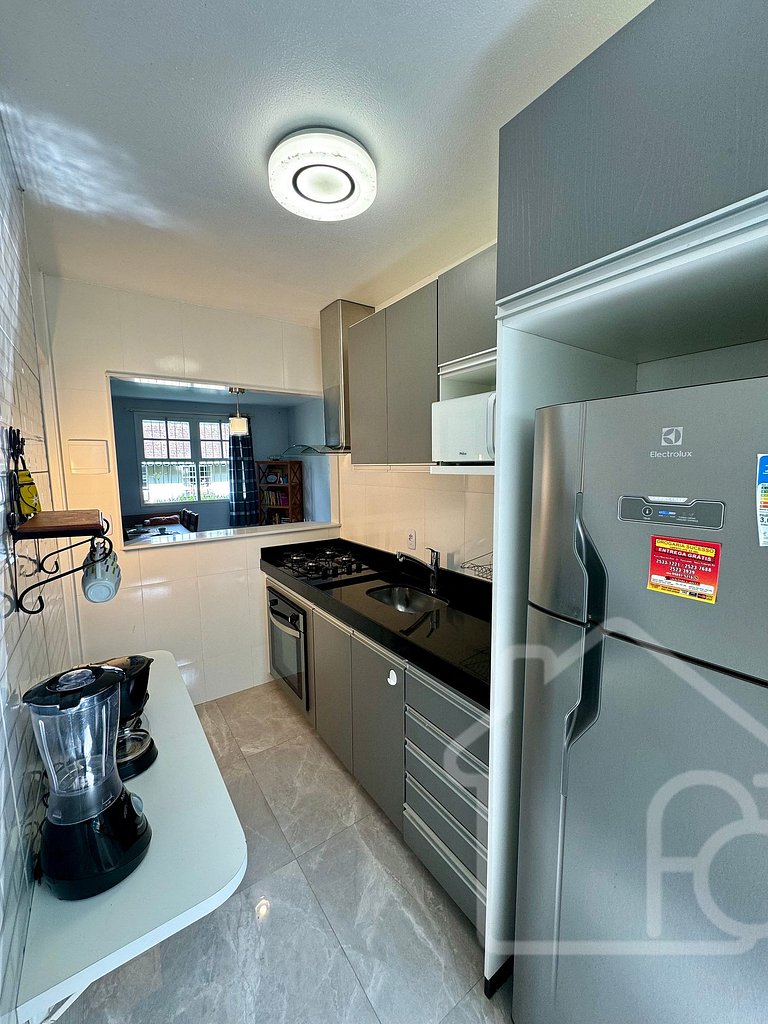 Apartamento em condomínio familiar