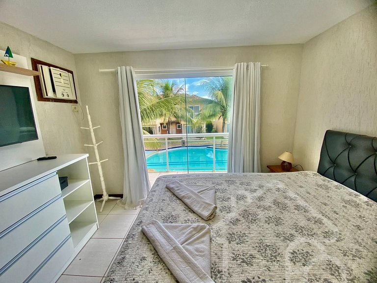 Casa com piscina em condomínio na Rasa