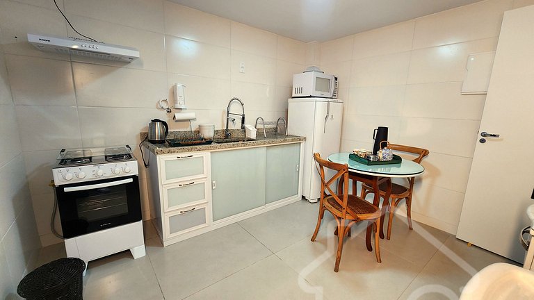 Apartamento com elevador e vaga no Cônego