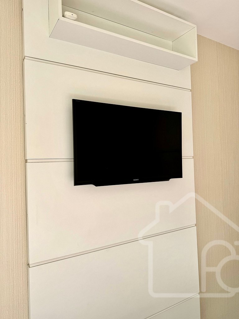 Apartamento central com piscina e playground