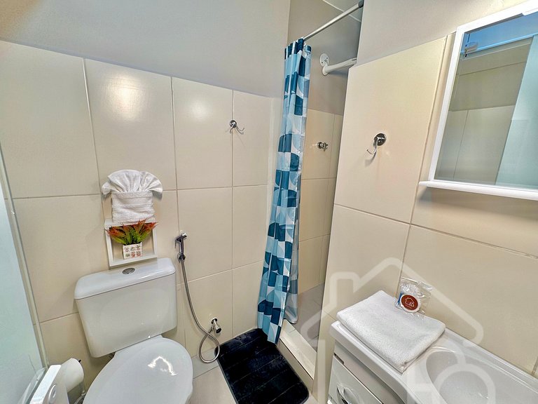 Estúdio no centro com ar-condicionado