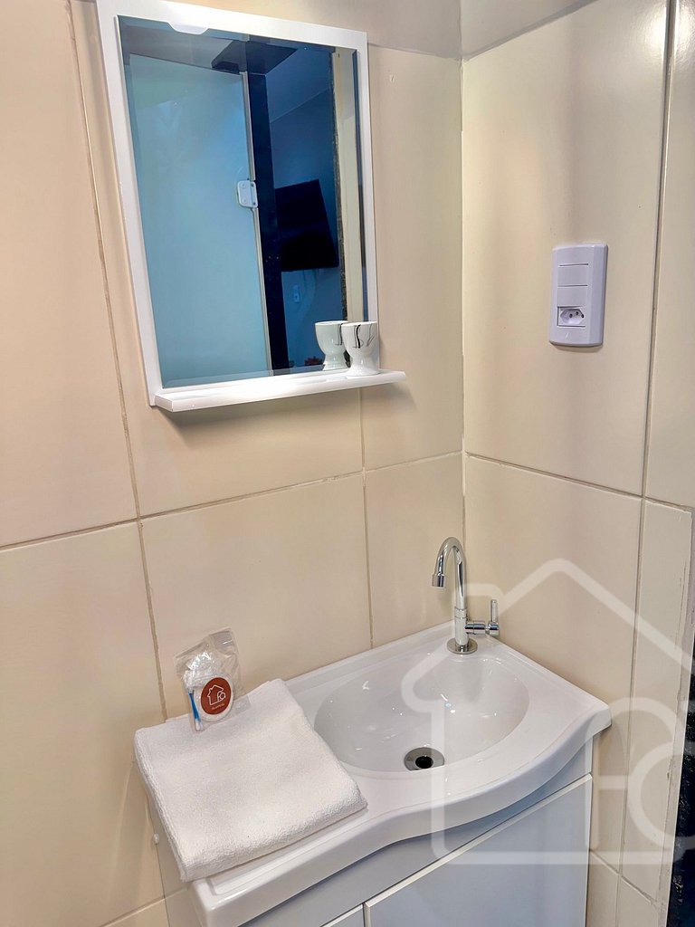 Estúdio no centro com ar-condicionado