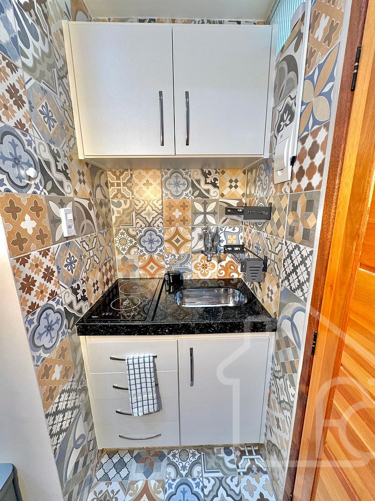 Estúdio no centro com ar-condicionado