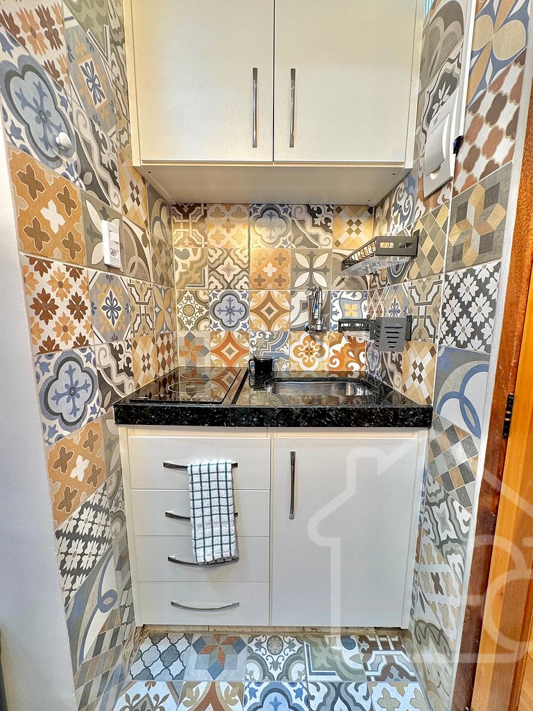 Estúdio no centro com ar-condicionado