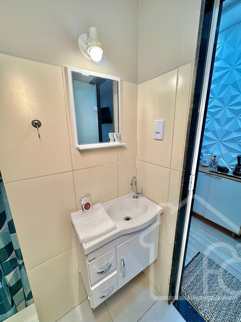 Estúdio no centro com ar-condicionado