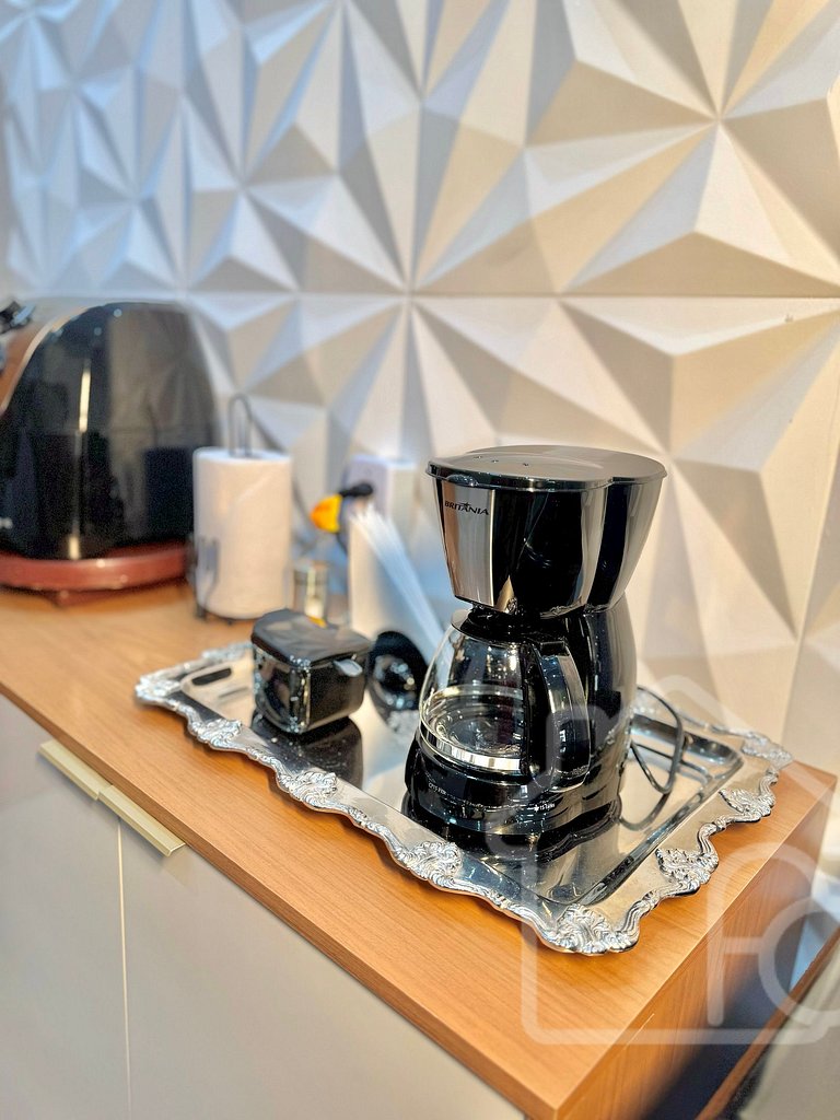 Estúdio no centro com ar-condicionado