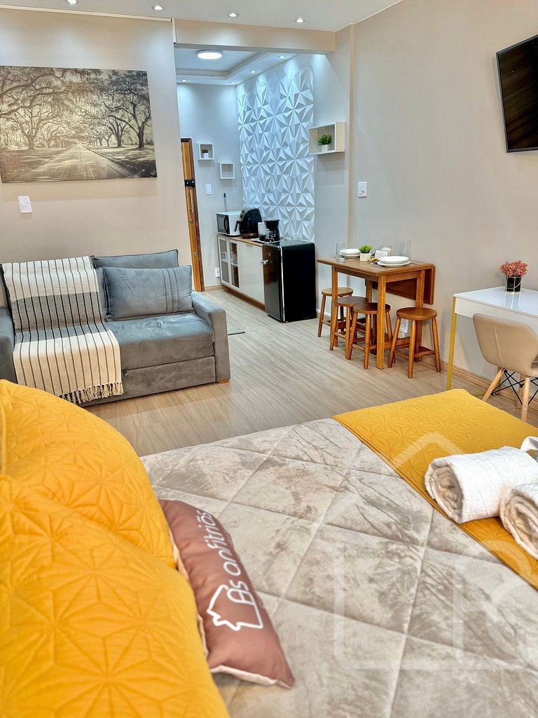 Estúdio no centro com ar-condicionado