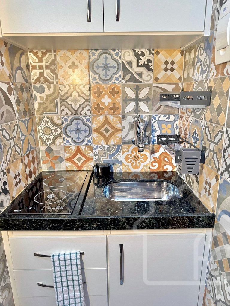 Estúdio no centro com ar-condicionado