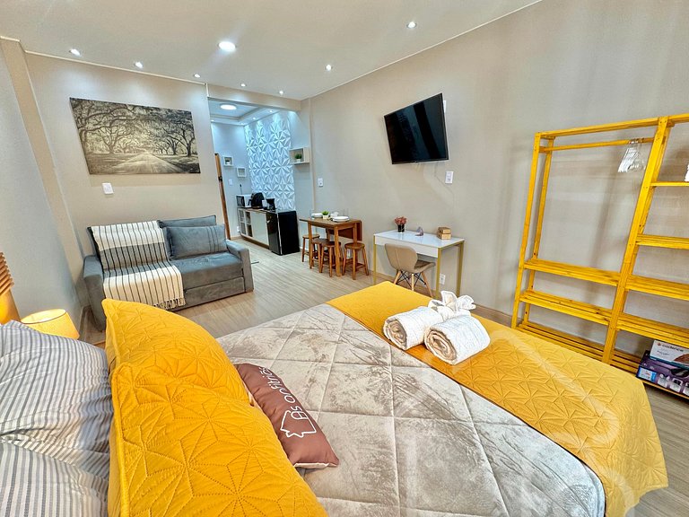 Estúdio no centro com ar-condicionado