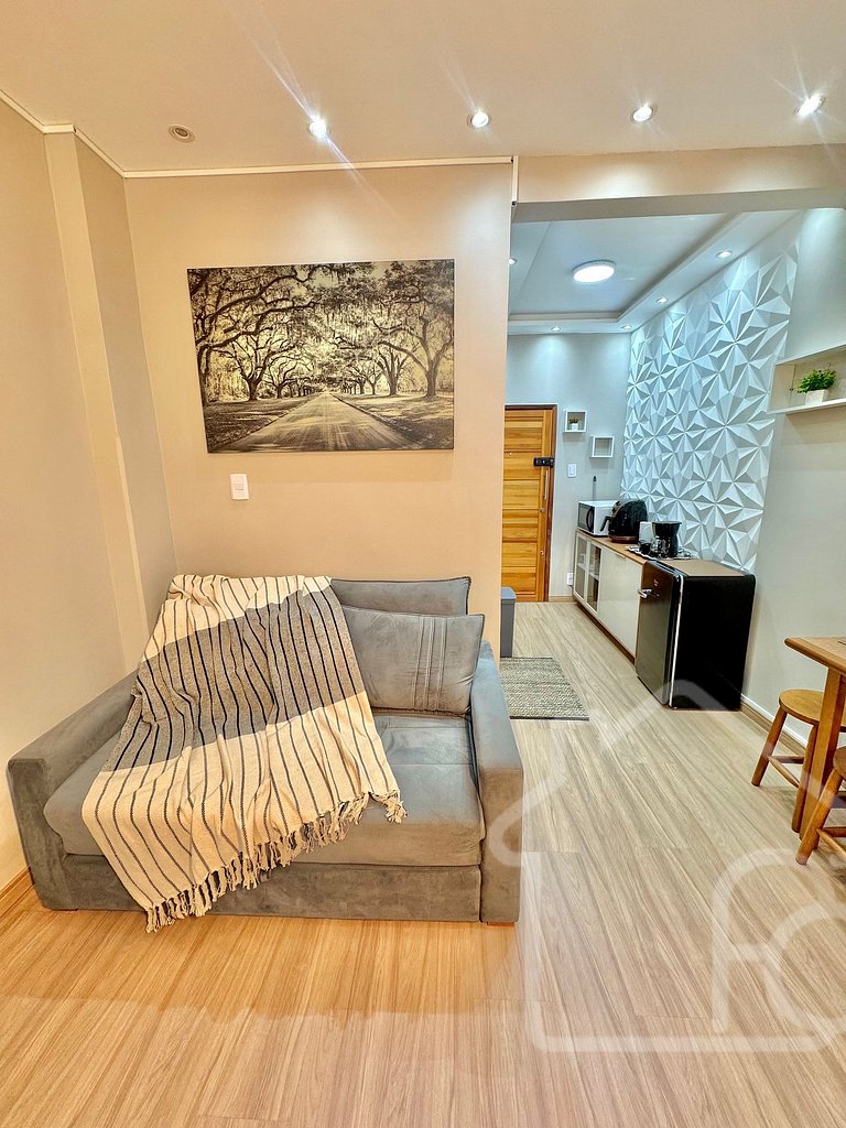 Estúdio no centro com ar-condicionado