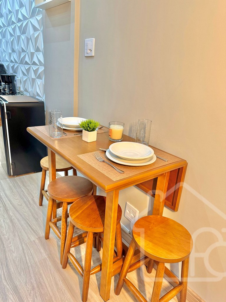 Estúdio no centro com ar-condicionado