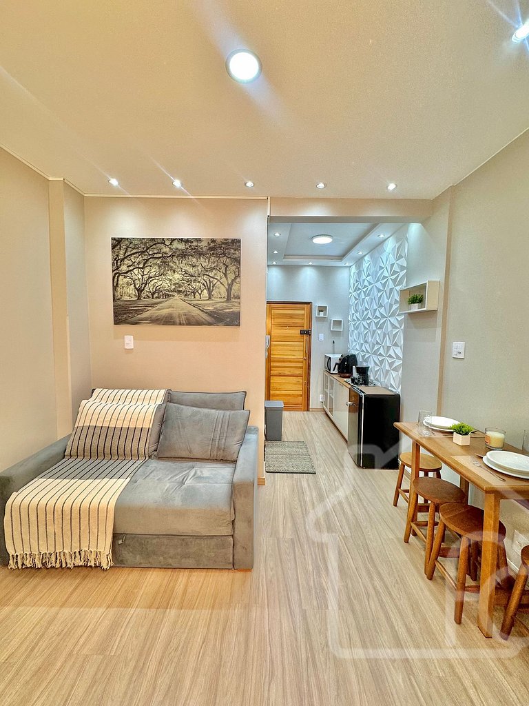 Estúdio no centro com ar-condicionado