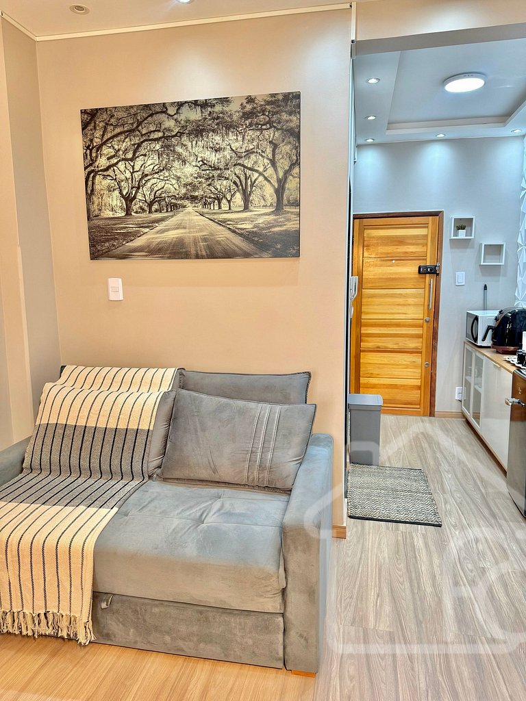 Estúdio no centro com ar-condicionado