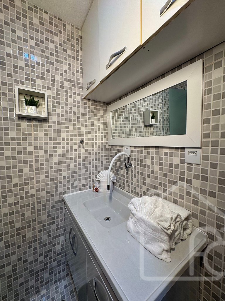 Apartamento central com ar-condicionado