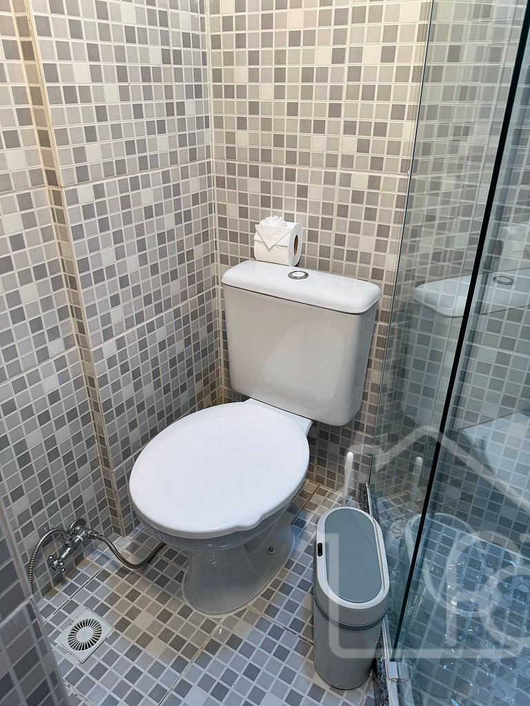 Apartamento central com ar-condicionado