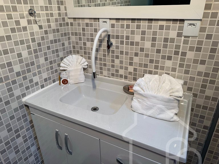 Apartamento central com ar-condicionado