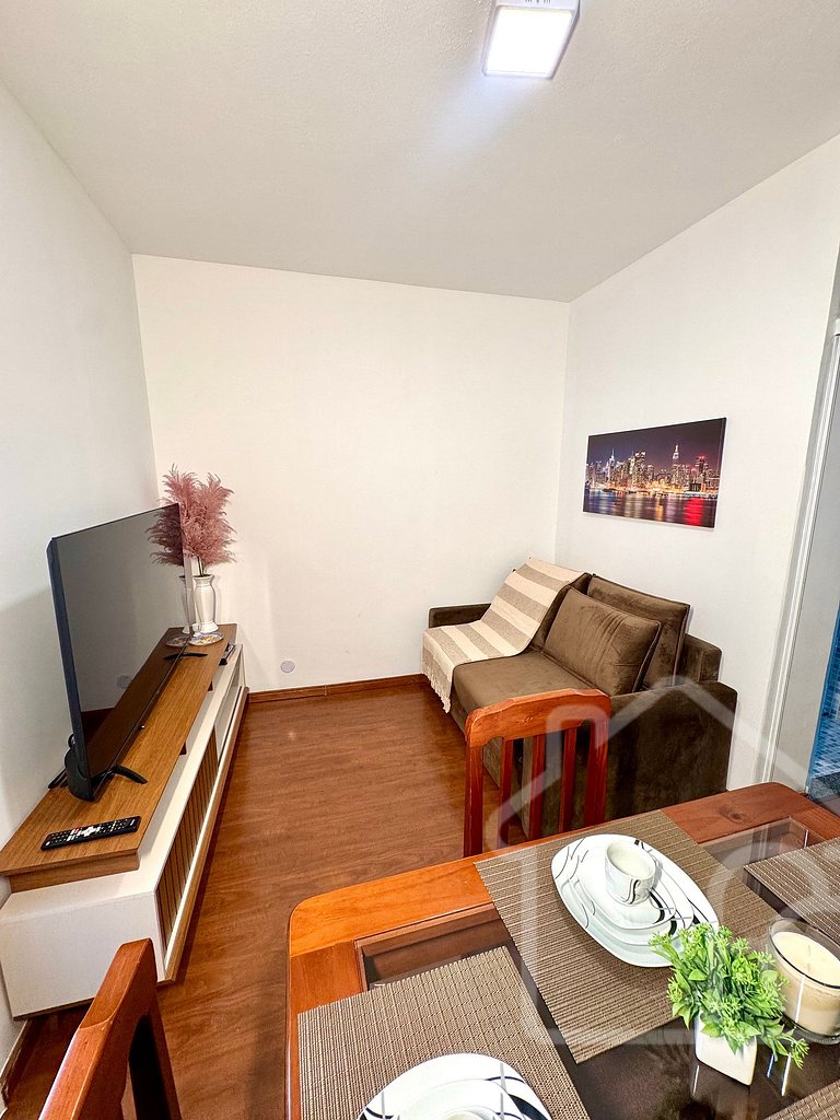 Apartamento central com ar-condicionado