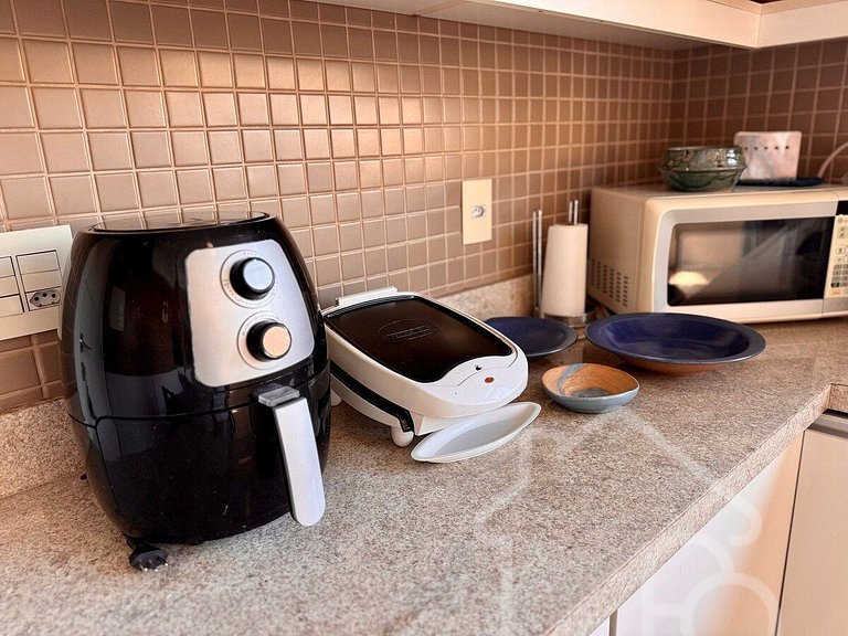 Apartamento central com piscina e playground