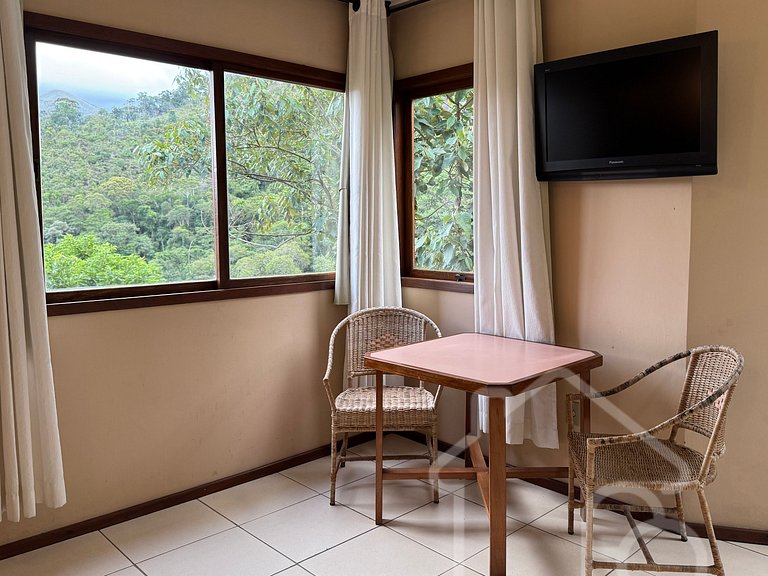 Suíte com vista da Serra