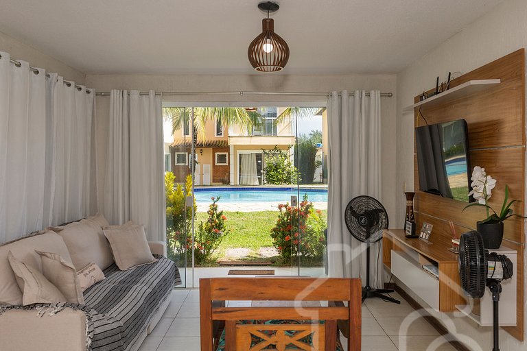 Casa com piscina em condomínio na Rasa