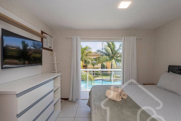 Casa com piscina em condomínio na Rasa