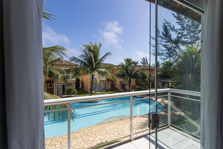Casa com piscina em condomínio na Rasa
