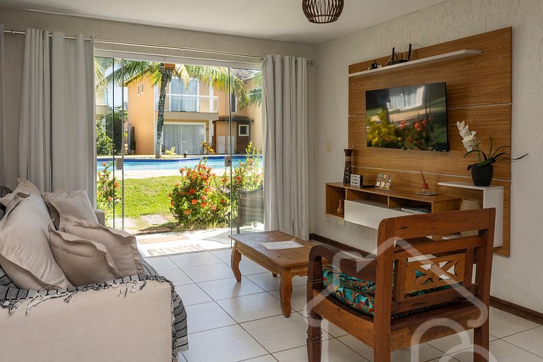 Casa com piscina em condomínio na Rasa